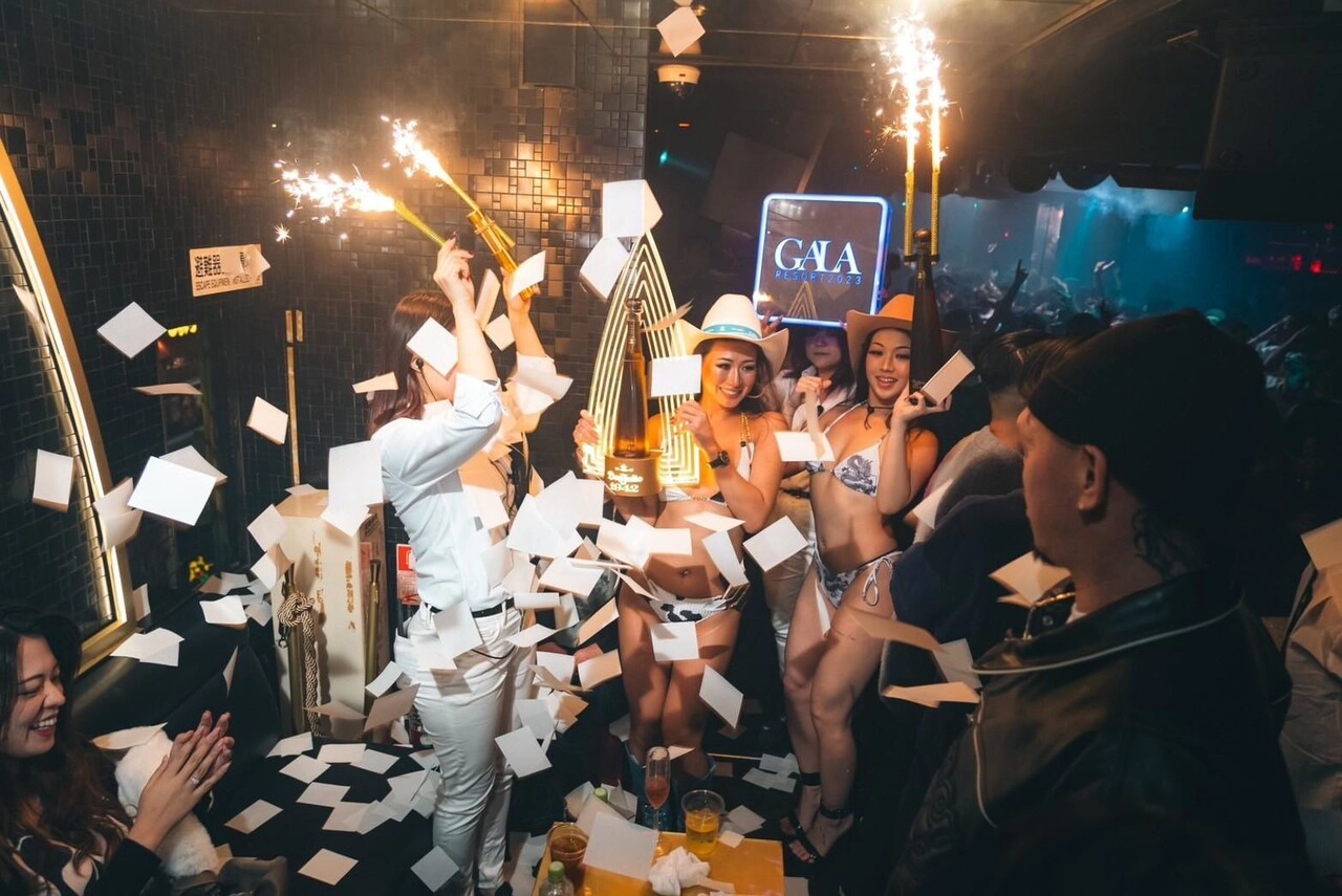 VIP group celebrating with sparklers and confetti at GALA RESORT